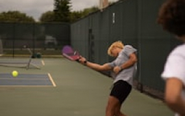 Youth pickleball action shot