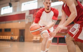 Men playing basketball