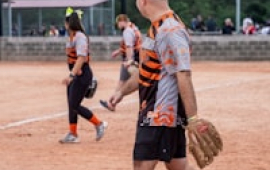 Adults playing coed softball