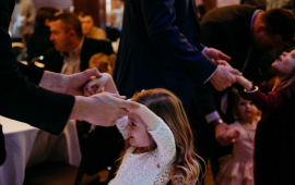 Fathers dancing with their daughters at the Daddy and Me Sweetheart Tea