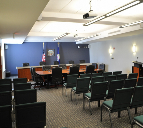 Photo of room with chairs and a podium