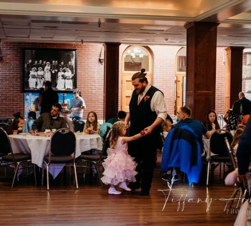 Father and daughter dancing at the annual Sweetheart Tea.