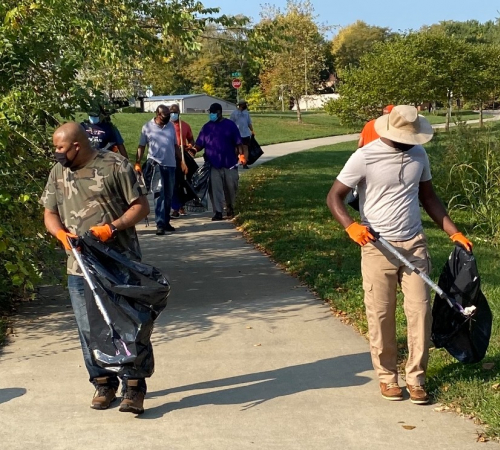 Photo of people volunteering for the three mile creek cleanup