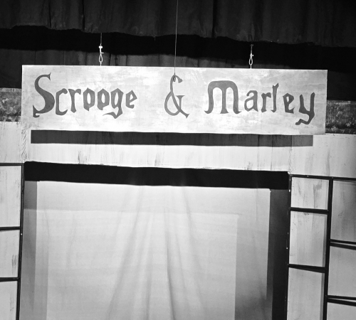 Set of A Christmas Carol 2025 Sign of Scrooge and Marley from 2025 Christmas Carol