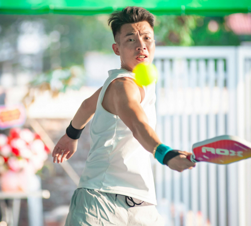 Young Male Pickleball Player in action