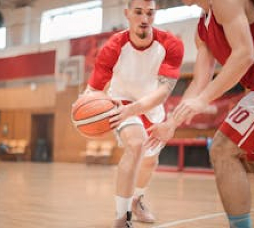 Men playing basketball