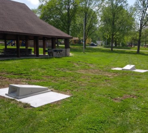 Picture of the large shelter that offers a set of cornhole court that requires you to bring your own bags to play
