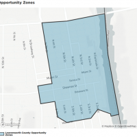 Opportunity Zone shows a map with a blue zone over Leavenworth bordered by the River, 7th Street, Metropolitan Street and Walnut