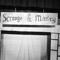 Set of A Christmas Carol 2025 Sign of Scrooge and Marley from 2025 Christmas Carol