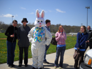Older kids talking to the Easter Bunny during the Easter Egg Hunt in 2011