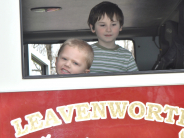 Children posing in a Leavenworth Fire Truck at the Easter Egg Hunt