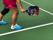 Pickleball paddle with a tie dye print