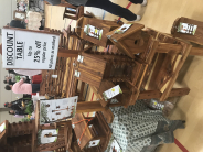 Holiday Bazaar and Flea Market 2019 Vendor selling cedar crafts from benches to bird houses to tables