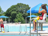 Two lifeguards on duty at Wollman Aquatic Center