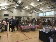 People shopping for gifts in the gymnasium at Riverfront Community Center in 2019