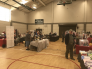 Different vendors selling holiday gifts for people during the Christmas in July market in 2019