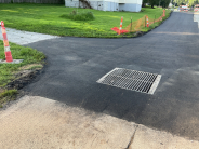 new asphalt and drain
