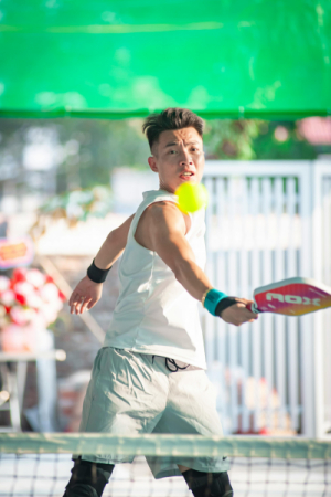 Young Male Pickleball Player in action