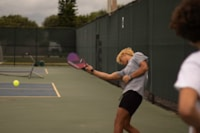 Youth pickleball action shot