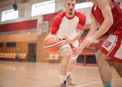Men playing basketball