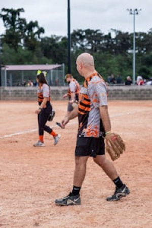 Adults playing coed softball