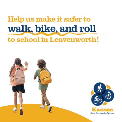 2 kids walk with packs, reads Help us make it safer to walk, bike and roll to school in Leavenworth Kansas Safe Routes to school