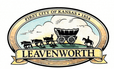 Logo of City with works Leavenworth, First City of Kansas 1854 and an ox-drawn covered wagon followed by a horse