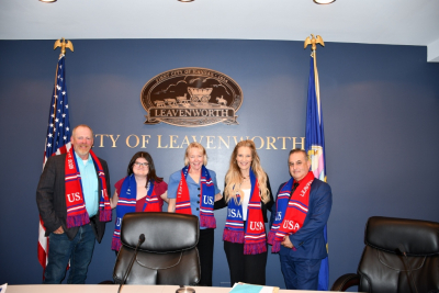 Fifa scarves Five elected city commissioners pose with FIFA scarves in front of City logo