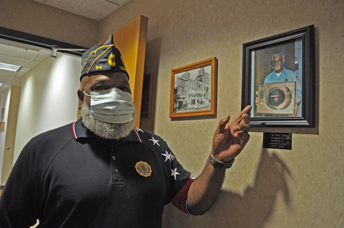 Rick Fields points out a photograph of his father, Charles Fields, First African American Firefighter in the city of Leavenworth Rick Fields points out a photograph of his father, Charles Fields, First African American Firefighter in the city of Leavenworth