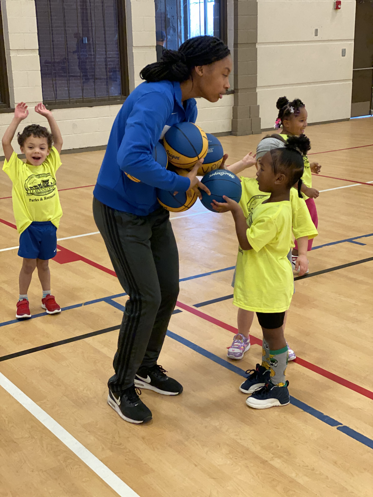 Bitty Ball 2023 Boys and girls ages three to six are playing basketball in the Riverfront Community Center gym