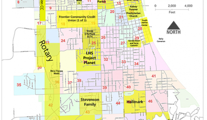map of Leavenworth divided into numbered grids, with some grids highlighted in yellow and names of teams for the cleanup listed