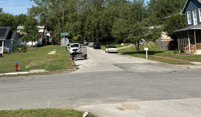 photo shows street with a partial sidewalk ending in grass at second and pottawatomie street